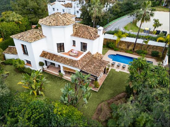 Charming Mediterranean Andalusian style villa in frontline golf