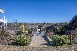 Island Living with Beachfront Garden