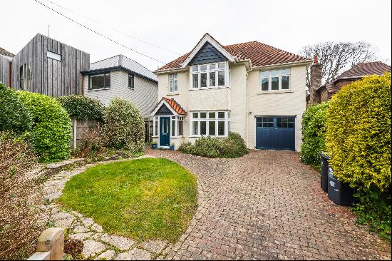 A refurbished, well-presented 1930s family house situated down a quiet lane on the edge of