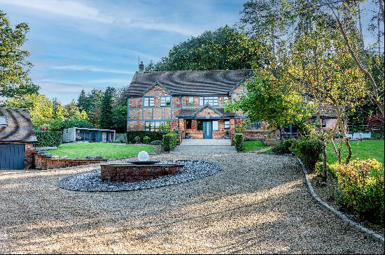 An impressive country home on the edge of a village