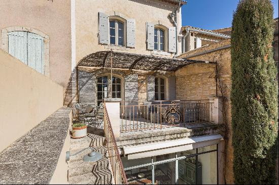 A lovely village house with a courtyard for sale in Goult.