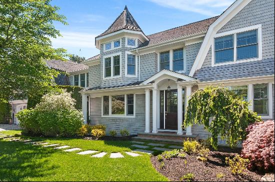 Tucked away in a prime Hamptons location, this beautifully designed home seamlessly blends