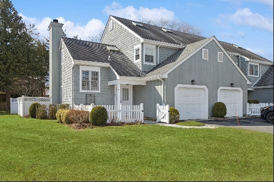 Welcome to 63 Brittany Lane, a vibrant gem nestled in the heart of Westhampton Beach, NY. 