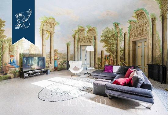 Elegant property divided into 3 apartments with original frescoes for sale in the heart of