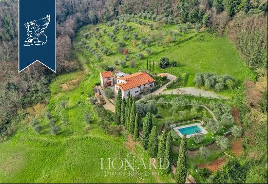 Charming historical estate with vast grounds for sale in Tuscany