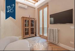 Rrefined apartment with small courtyard for sale in Florence's San Lorenzo district