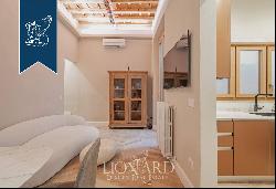 Rrefined apartment with small courtyard for sale in Florence's San Lorenzo district