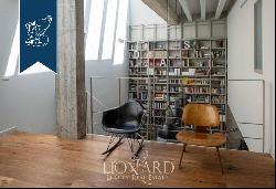 Inside a newly-built apartment building, this wonderful designer loft is for sale with a g