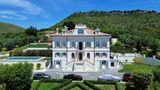 LUXURY 19TH-CENTURY VILLA WITH POOL, TENNIS COURT, AND OLIVE GROVE.