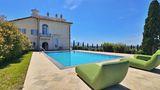 LUXURY 19TH-CENTURY VILLA WITH POOL, TENNIS COURT, AND OLIVE GROVE.