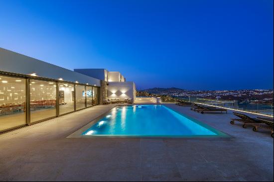 Villa Maria, A brand-new luxury estate offering breathtaking panoramic views of Korfos, Ornos, and Mykonos Town, ideally located on Korfos Beach